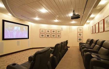 Private luxury screening theater with tiered seating at Vizcayne