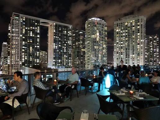 Area 31 rooftop dining terrace with Biscayne Bay backdrop